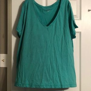 Green v-neck shirt